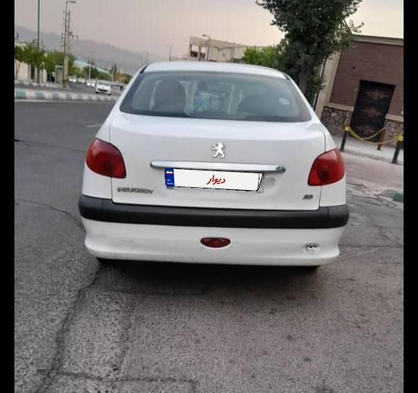پژو ۲۰۶ صندوق دار v8 - 1394
