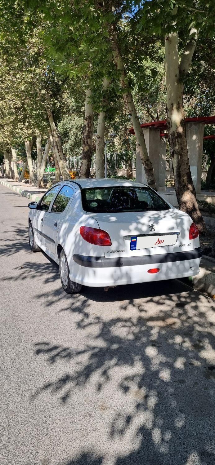 پژو ۲۰۶ صندوق دار v8 - 1397
