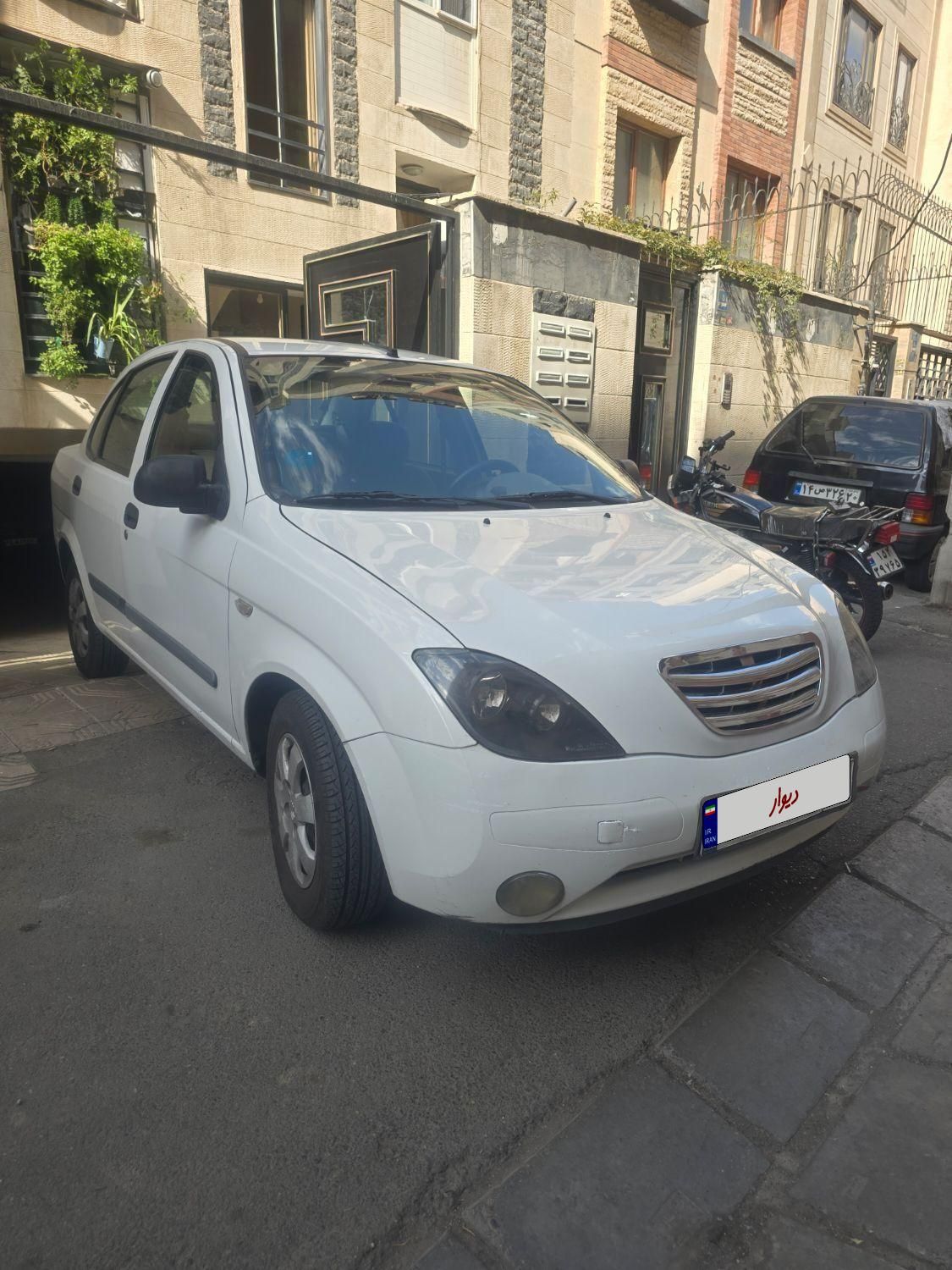 تیبا صندوق دار SX - 1392