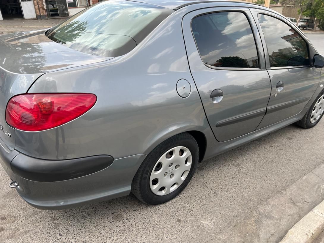 پژو ۲۰۶ صندوق دار v8 - 1394
