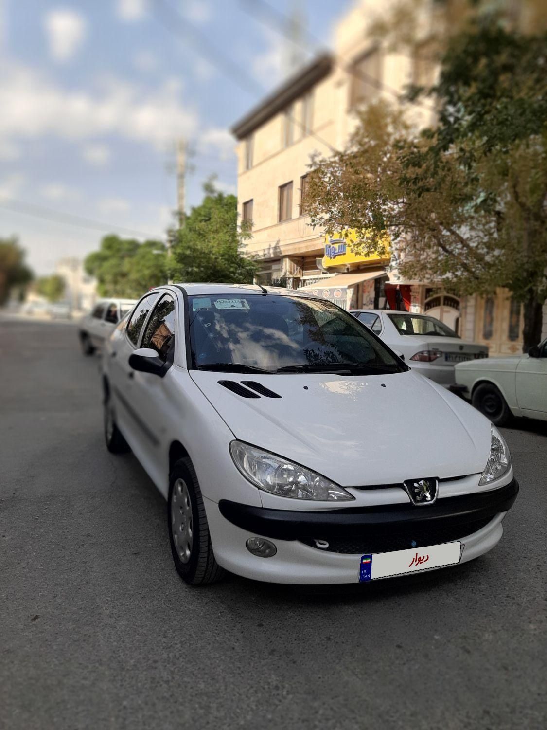 پژو ۲۰۶ صندوق دار v8 - 1396