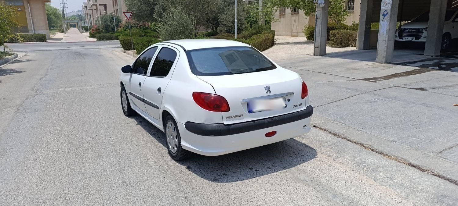 پژو ۲۰۶ صندوق دار v8 - 1396