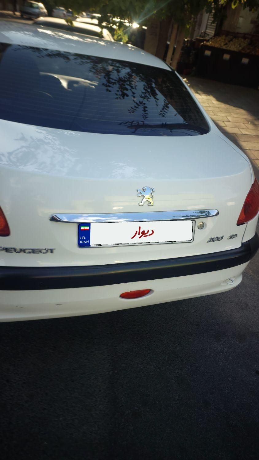پژو ۲۰۶ صندوق دار v8 - 1396