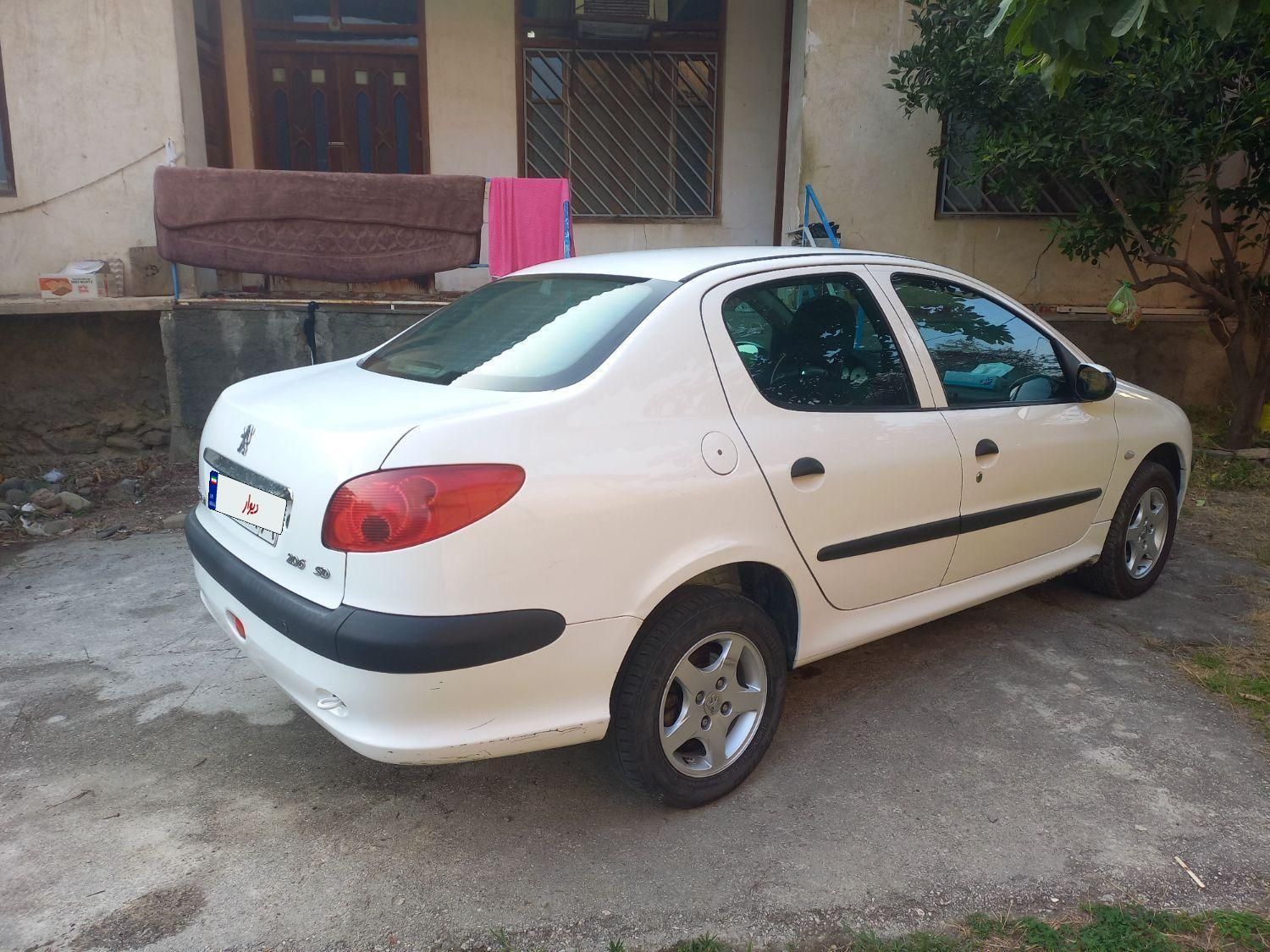 پژو ۲۰۶ صندوق دار v8 - 1395