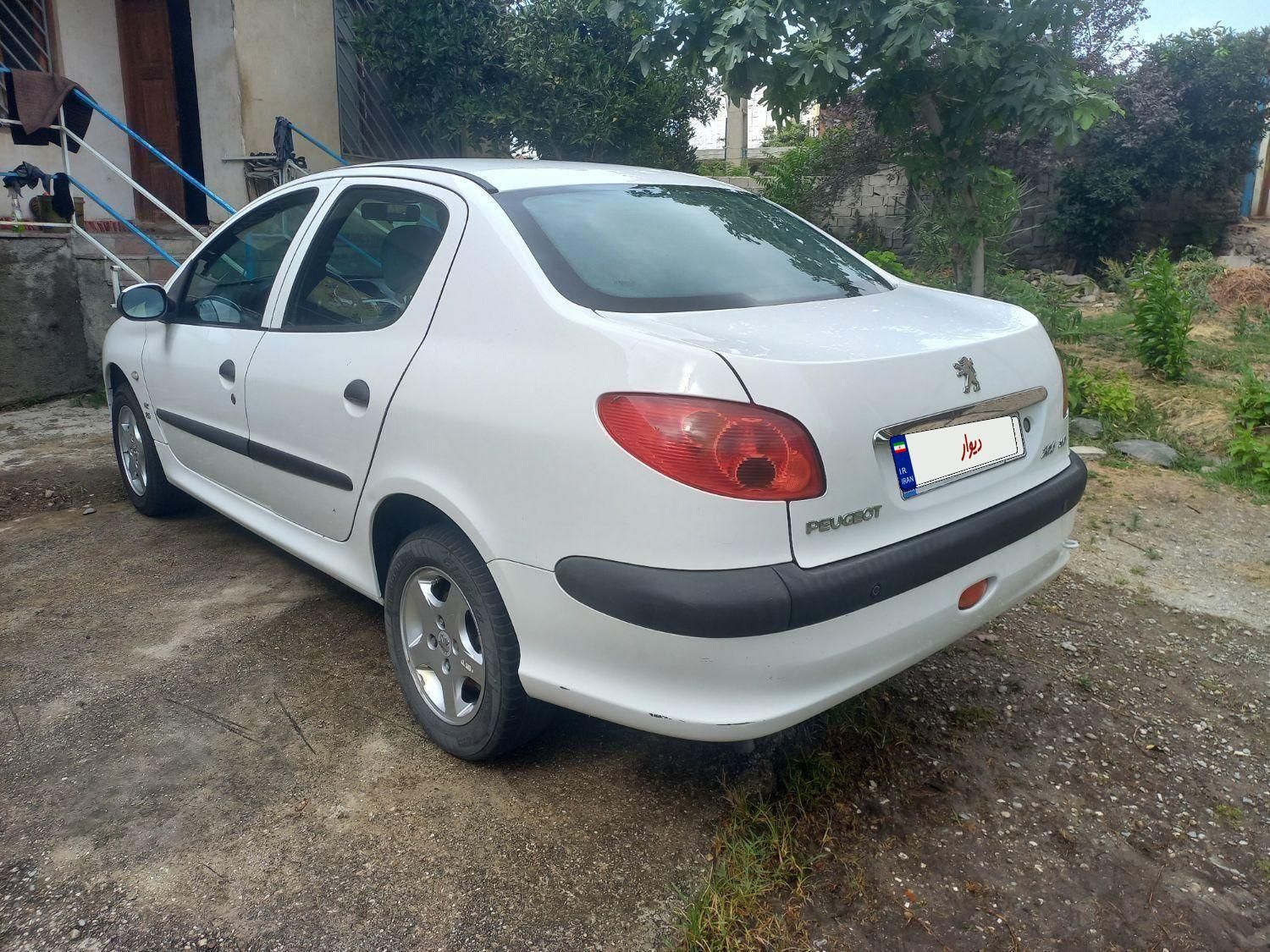 پژو ۲۰۶ صندوق دار v8 - 1395
