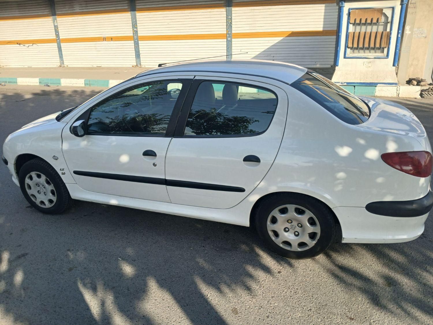 پژو ۲۰۶ صندوق دار v8 - 1390