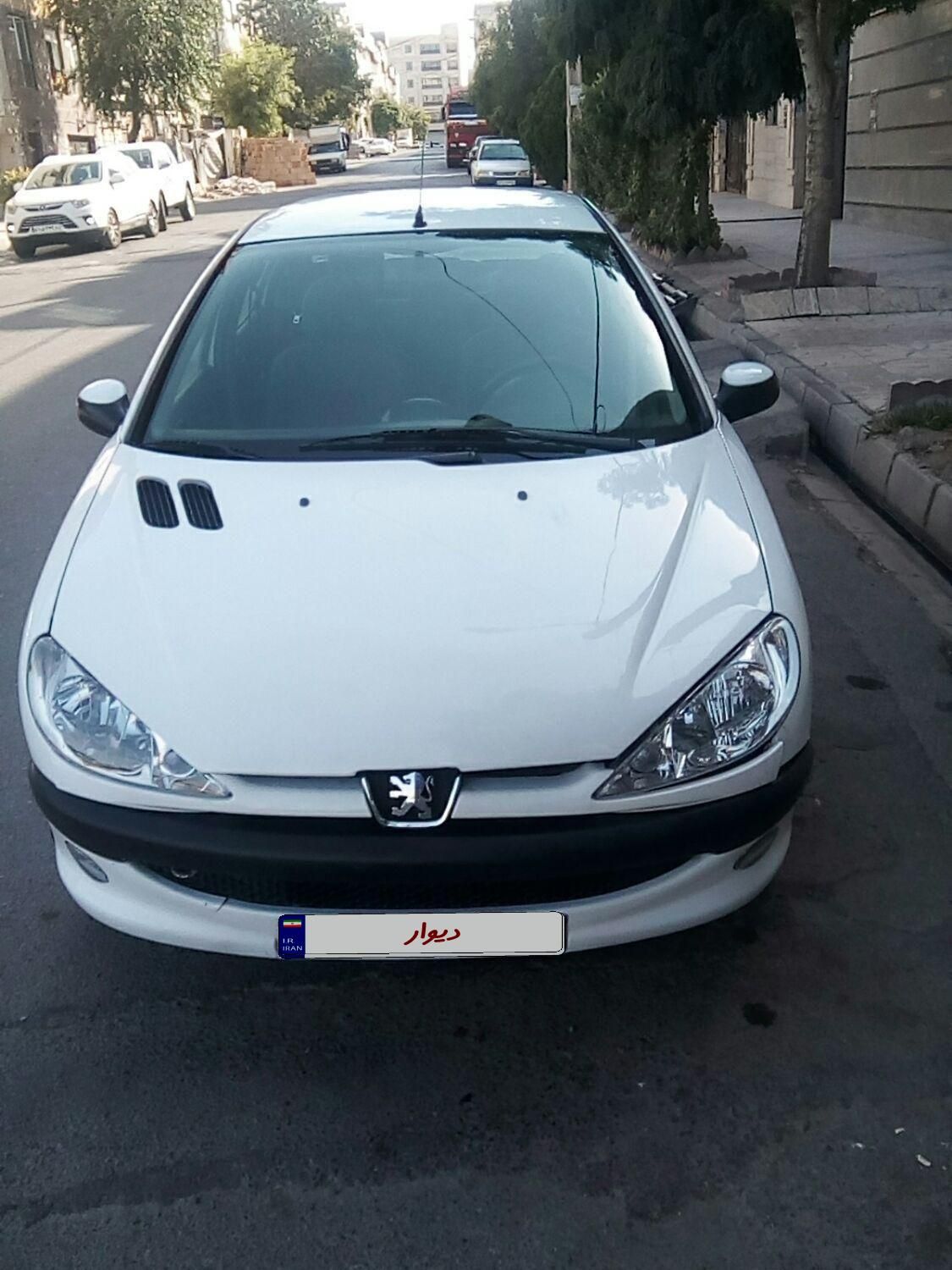 پژو ۲۰۶ صندوق دار v8 - 1396