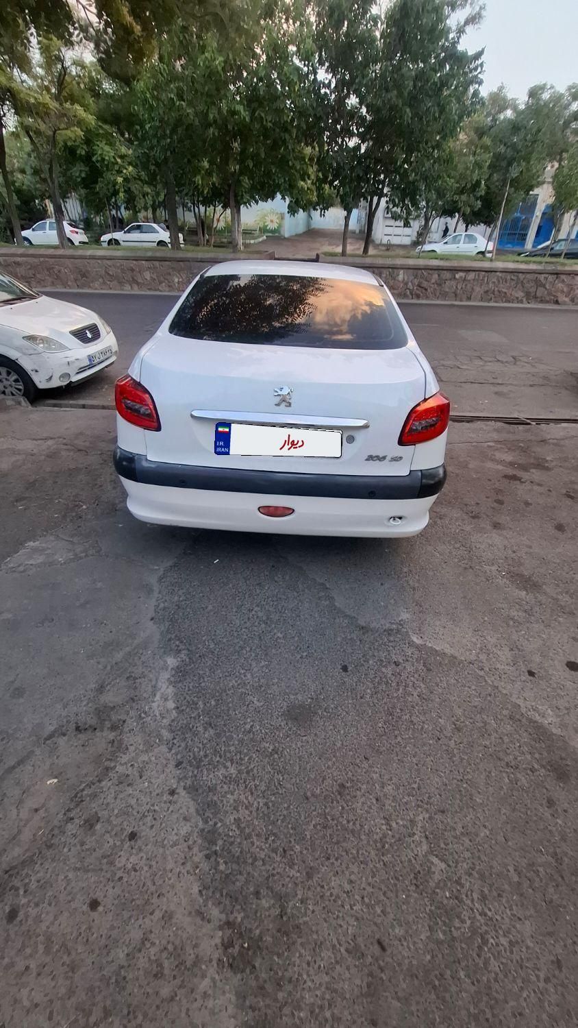 پژو ۲۰۶ صندوق دار v8 - 1395