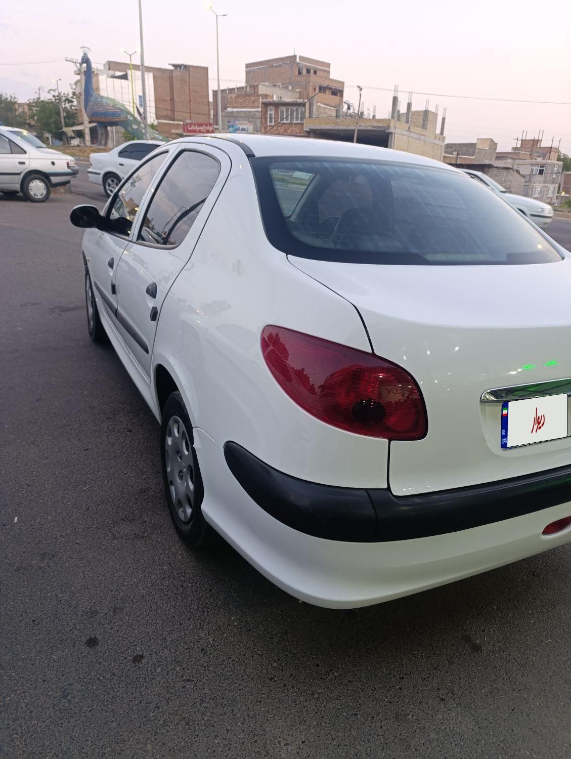 پژو ۲۰۶ صندوق دار v8 - 1396