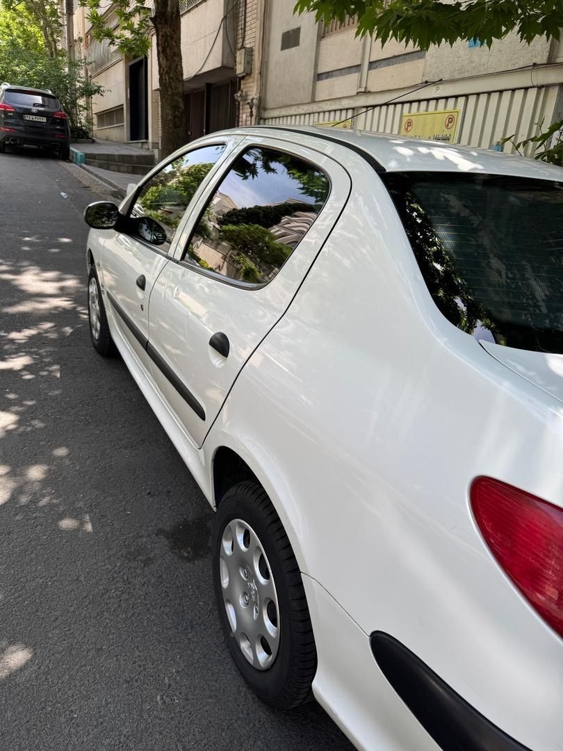 پژو ۲۰۶ صندوق دار v8 - 1394