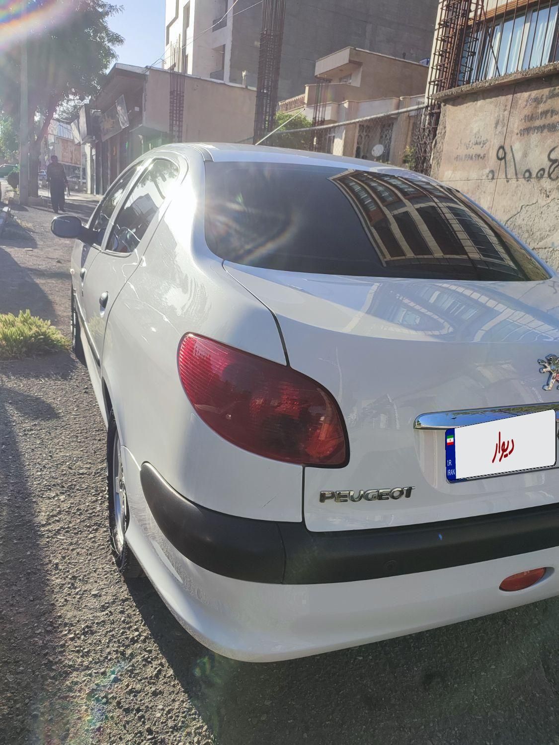 پژو ۲۰۶ صندوق دار v8 - 1397