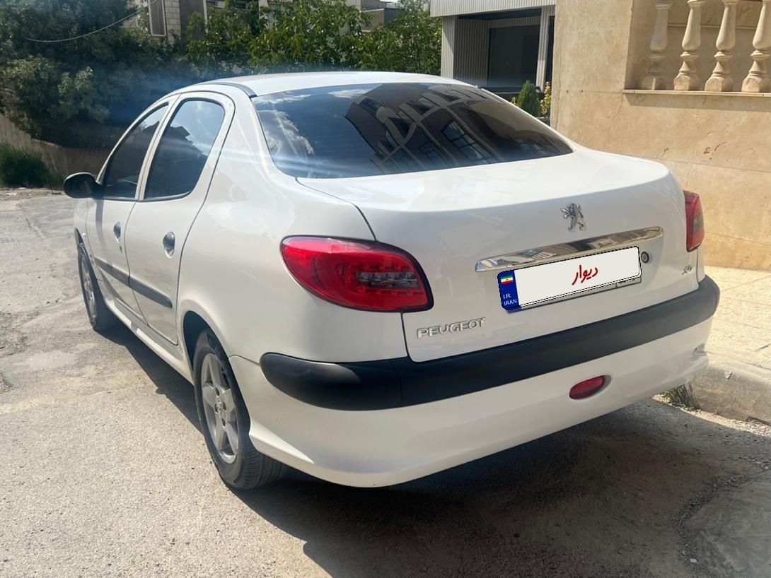 پژو ۲۰۶ صندوق دار v8 - 1399