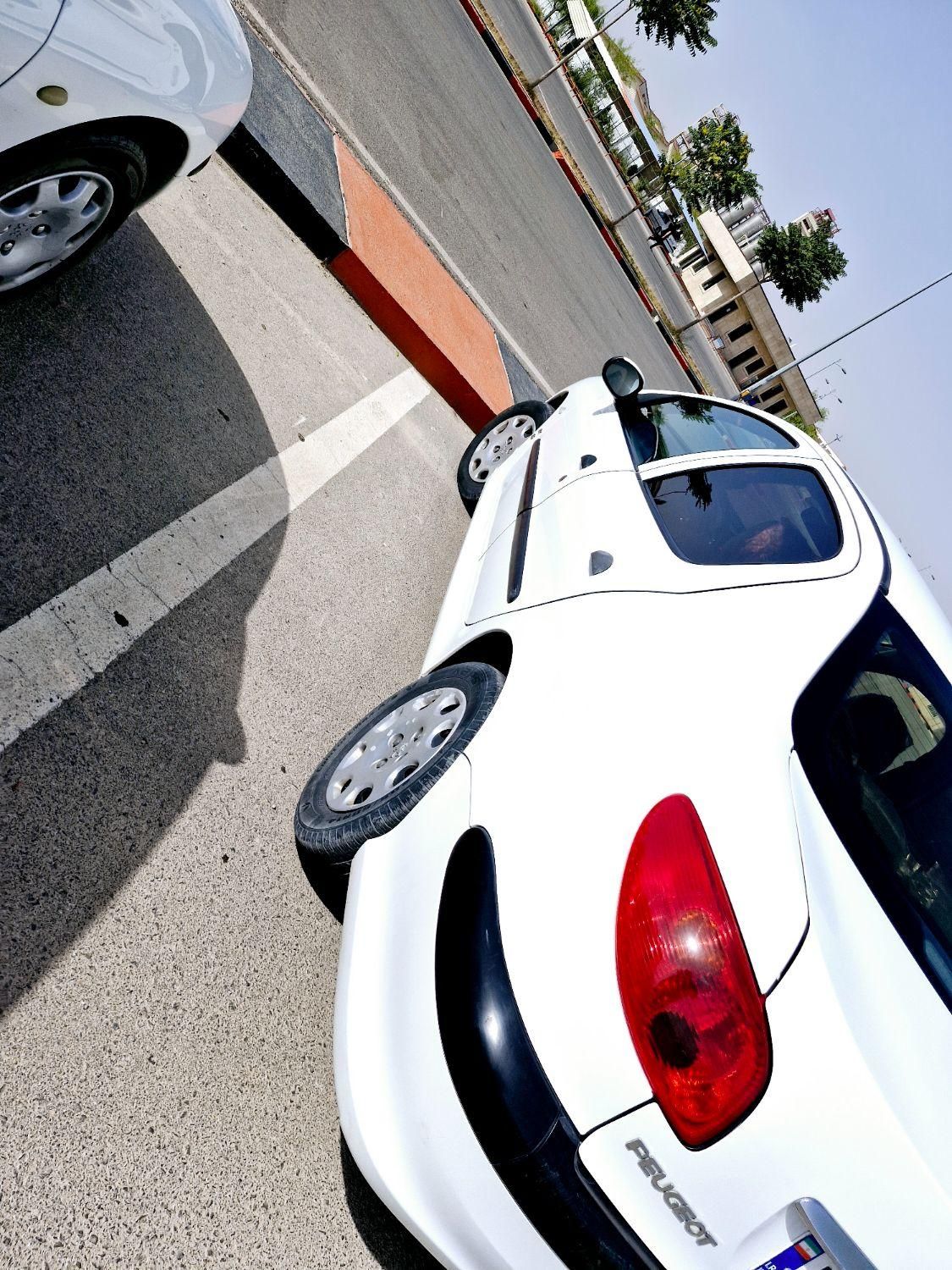 پژو ۲۰۶ صندوق دار v8 - 1399