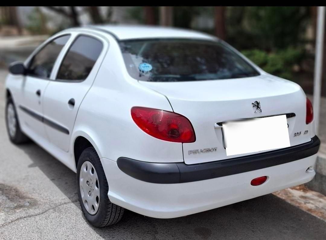 پژو ۲۰۶ صندوق دار v8 - 1397