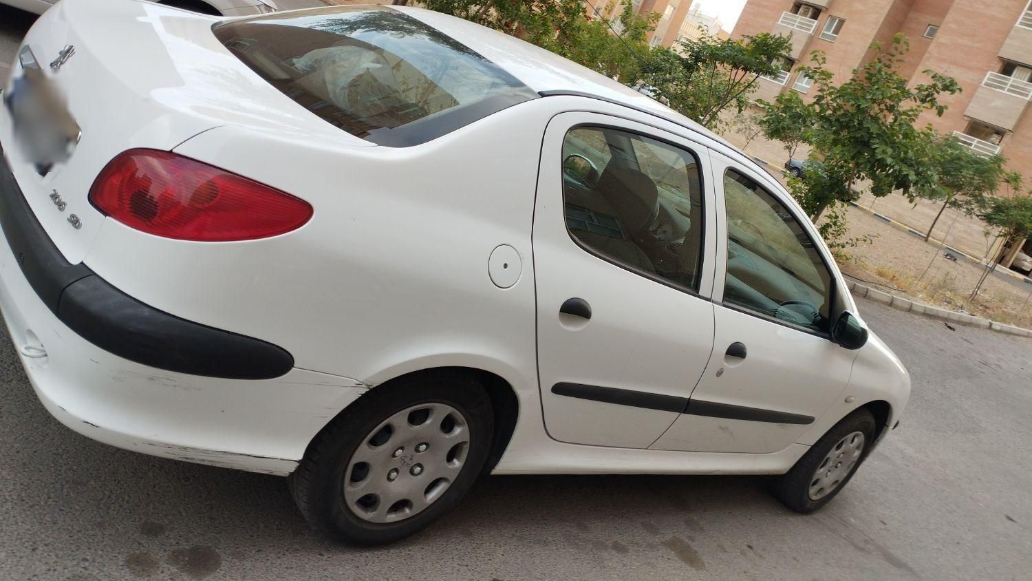پژو ۲۰۶ صندوق دار v8 - 1395