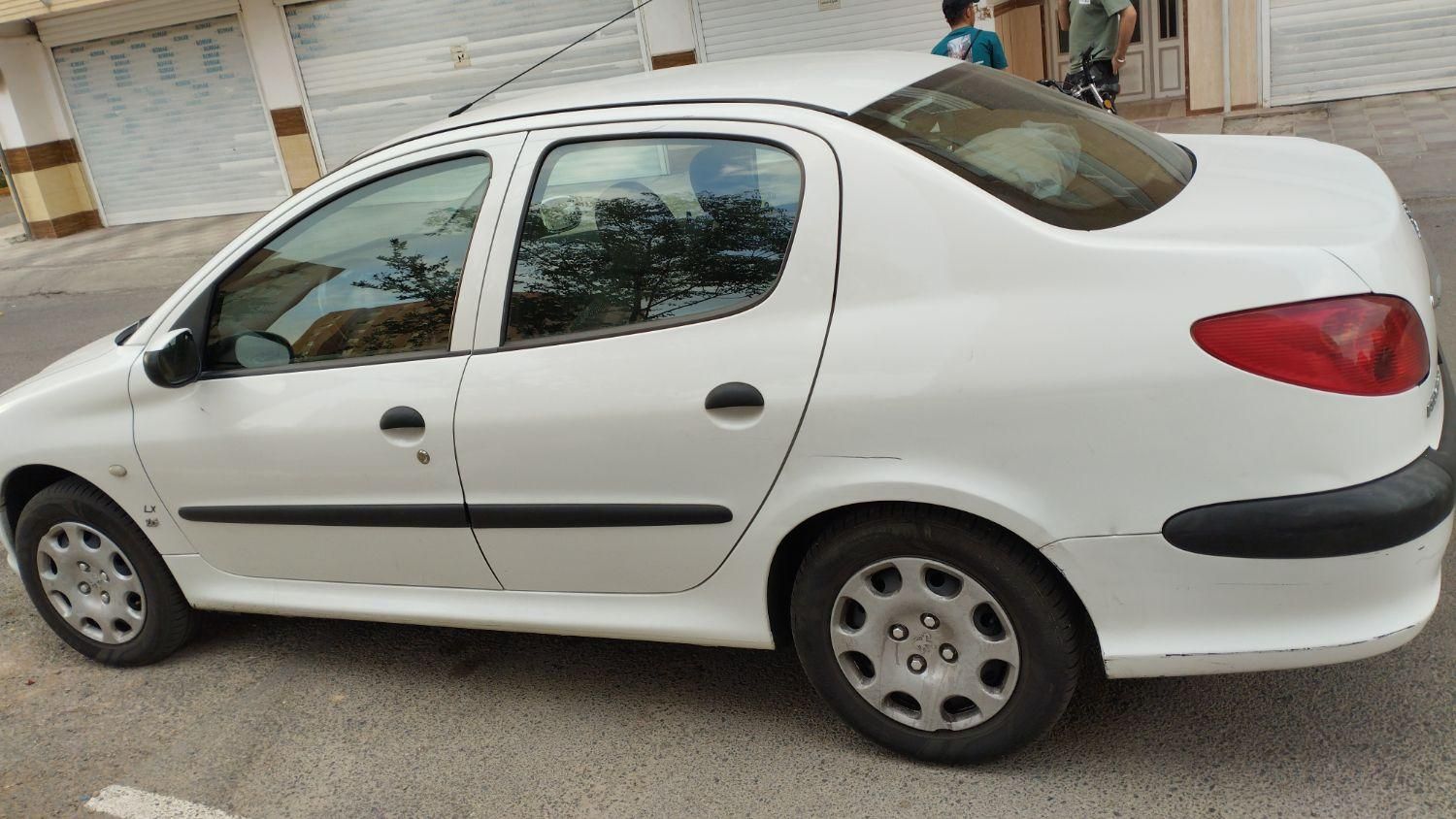پژو ۲۰۶ صندوق دار v8 - 1395