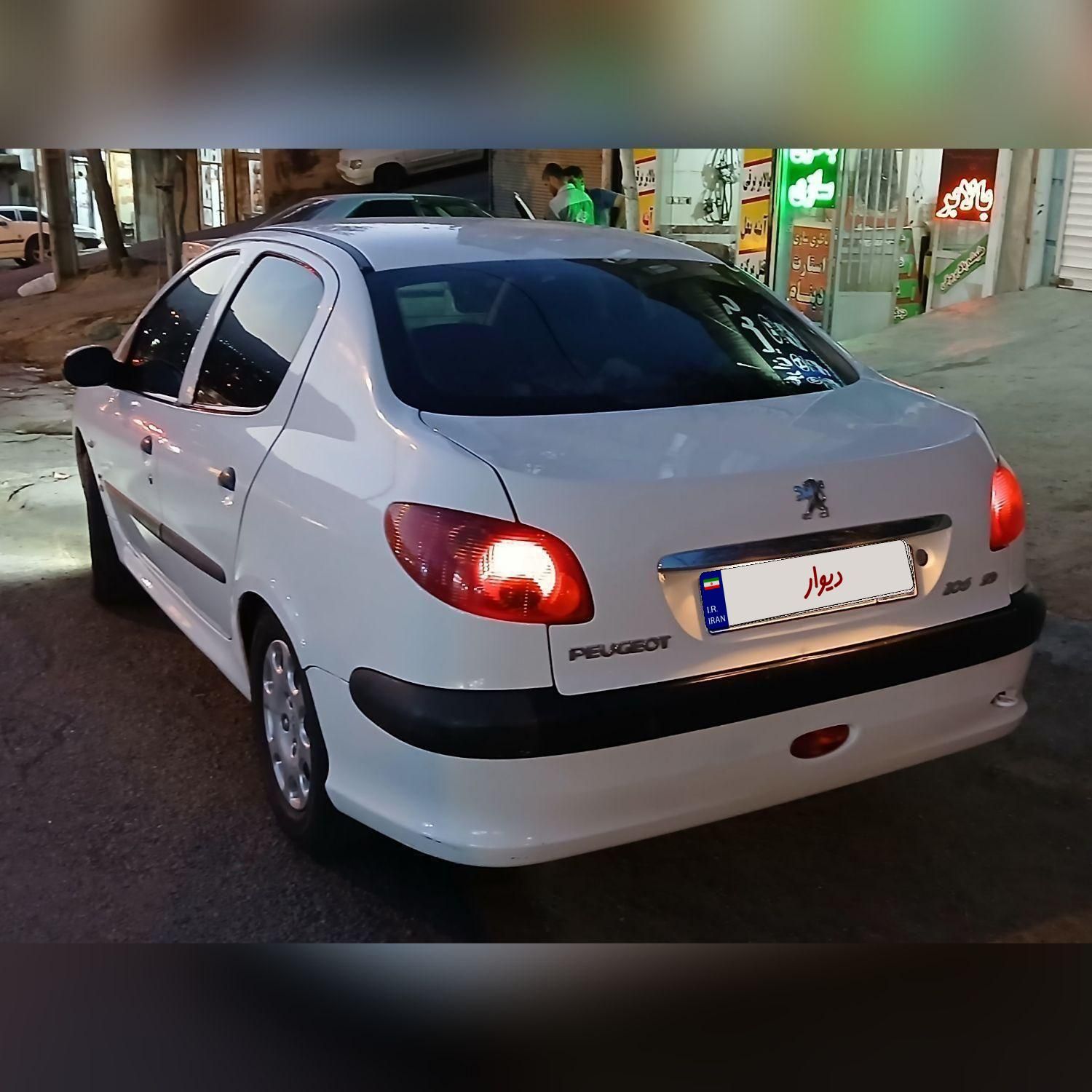 پژو ۲۰۶ صندوق دار v8 - 1395