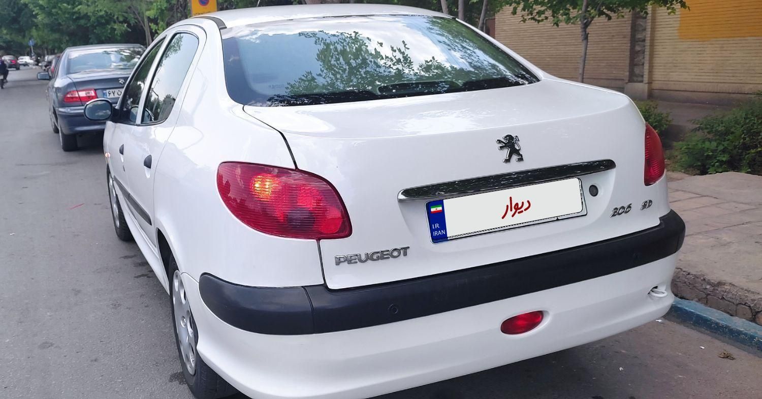 پژو ۲۰۶ صندوق دار v8 - 1396