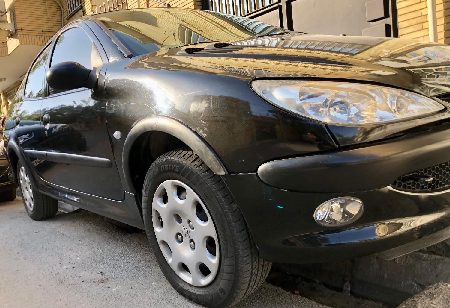 پژو ۲۰۶ صندوق دار v8 - 1391