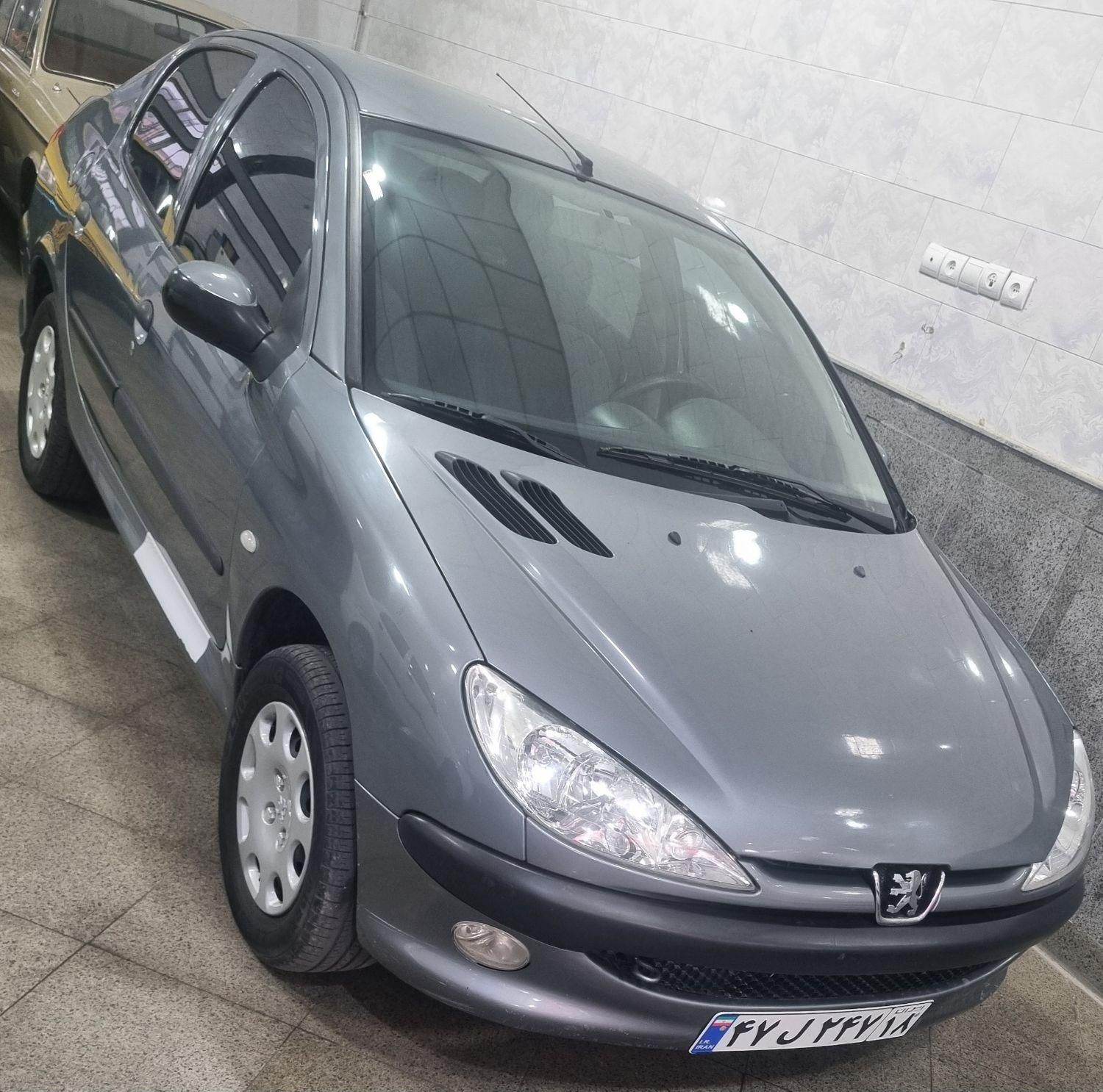 پژو ۲۰۶ صندوق دار v8 - 1399