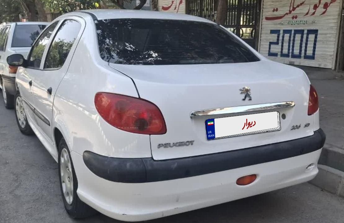 پژو ۲۰۶ صندوق دار v8 - 1395