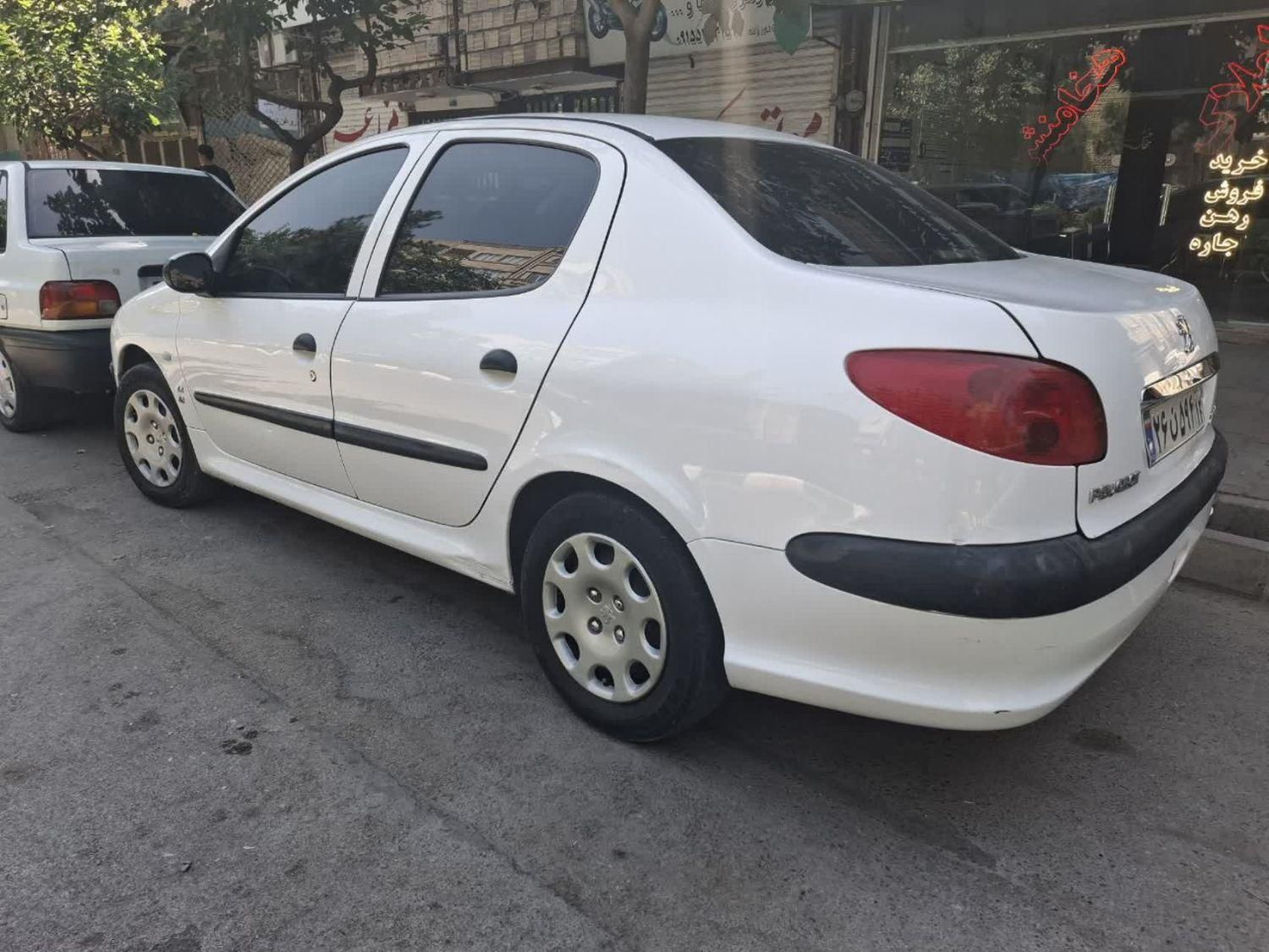 پژو ۲۰۶ صندوق دار v8 - 1395
