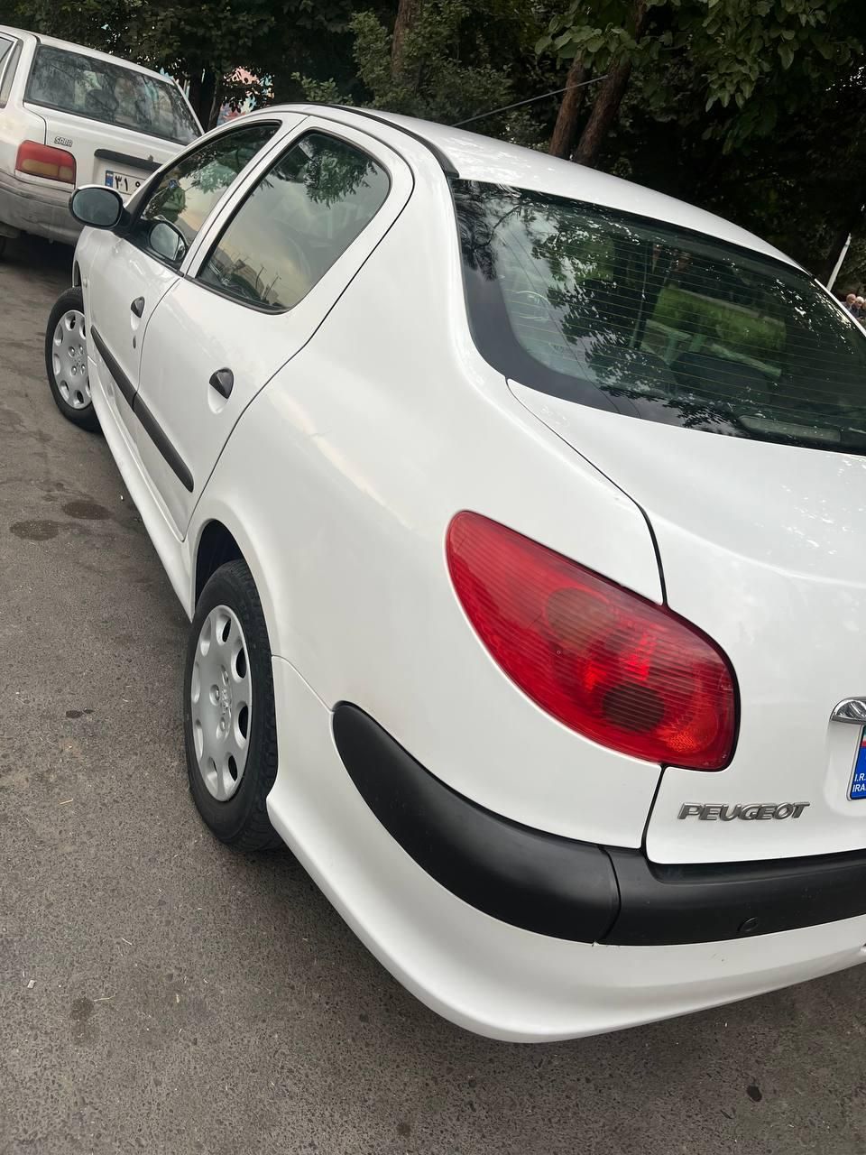 پژو ۲۰۶ صندوق دار v8 - 1396