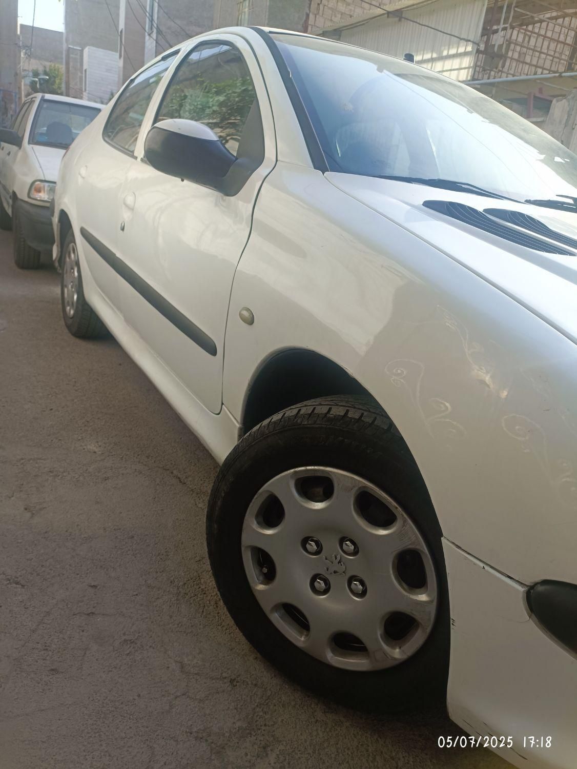 پژو ۲۰۶ صندوق دار v8 - 1394
