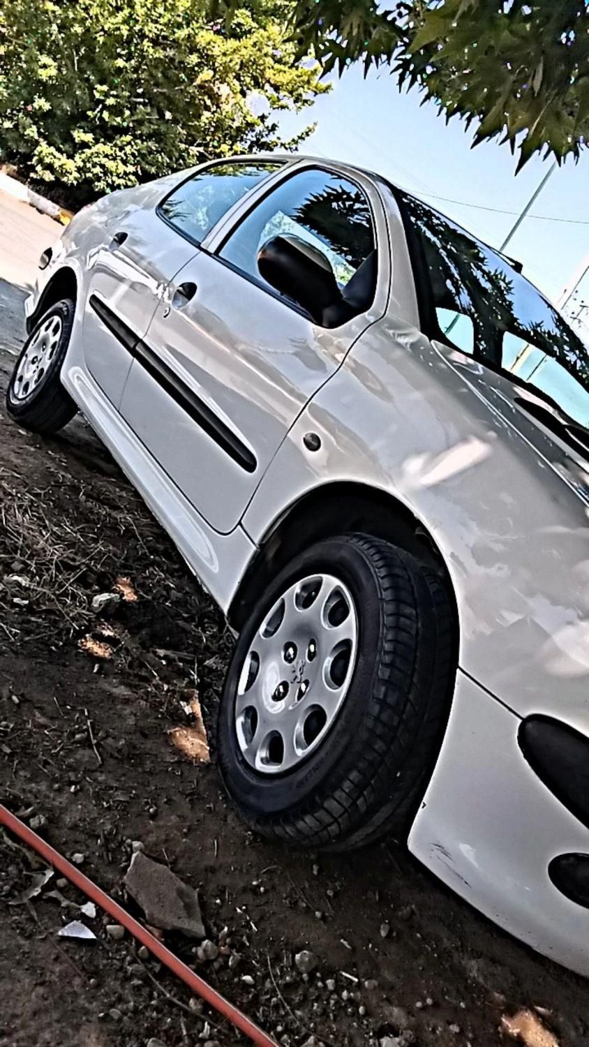 پژو ۲۰۶ صندوق دار v8 - 1394