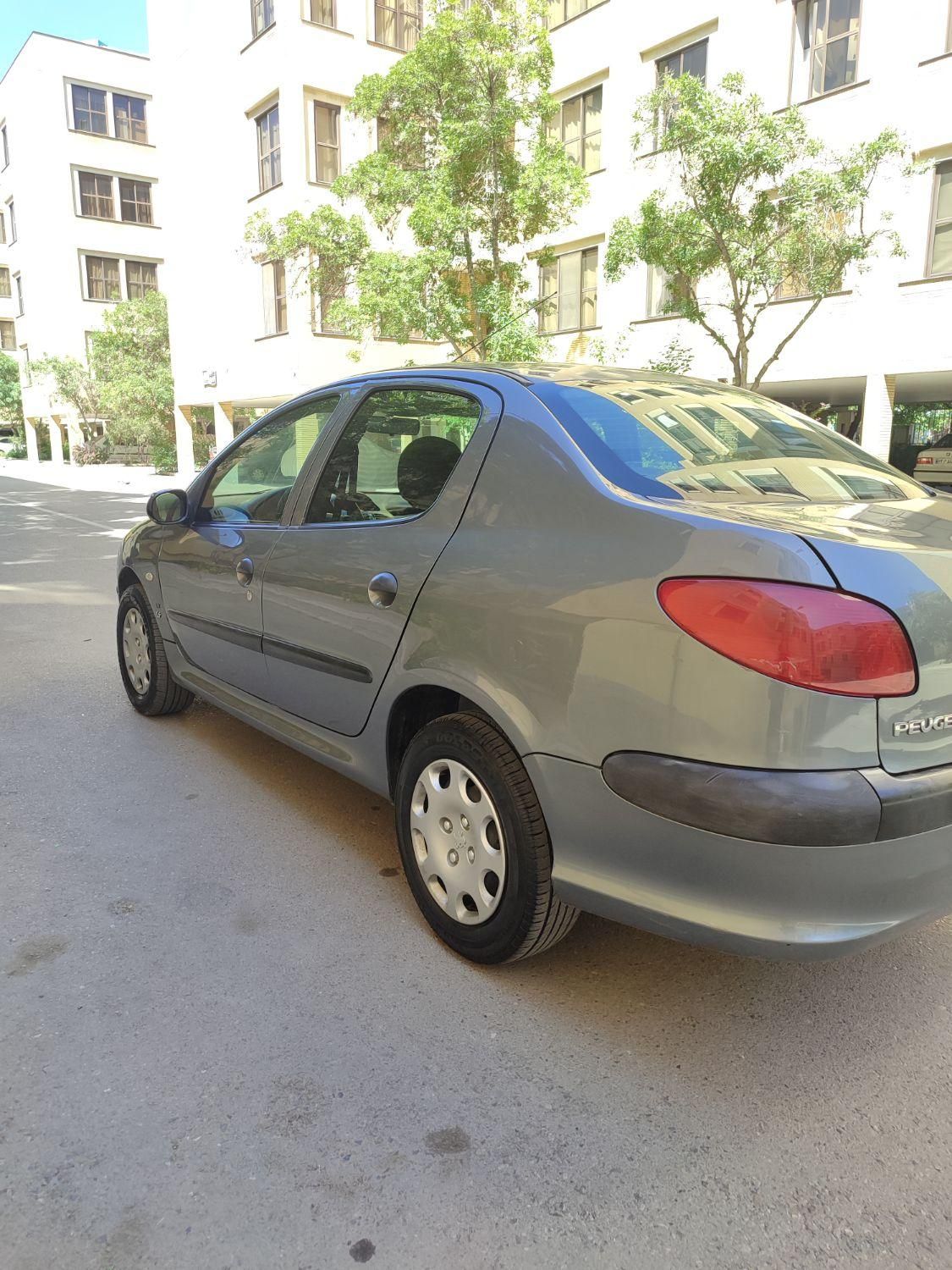 پژو ۲۰۶ صندوق دار v8 - 1395