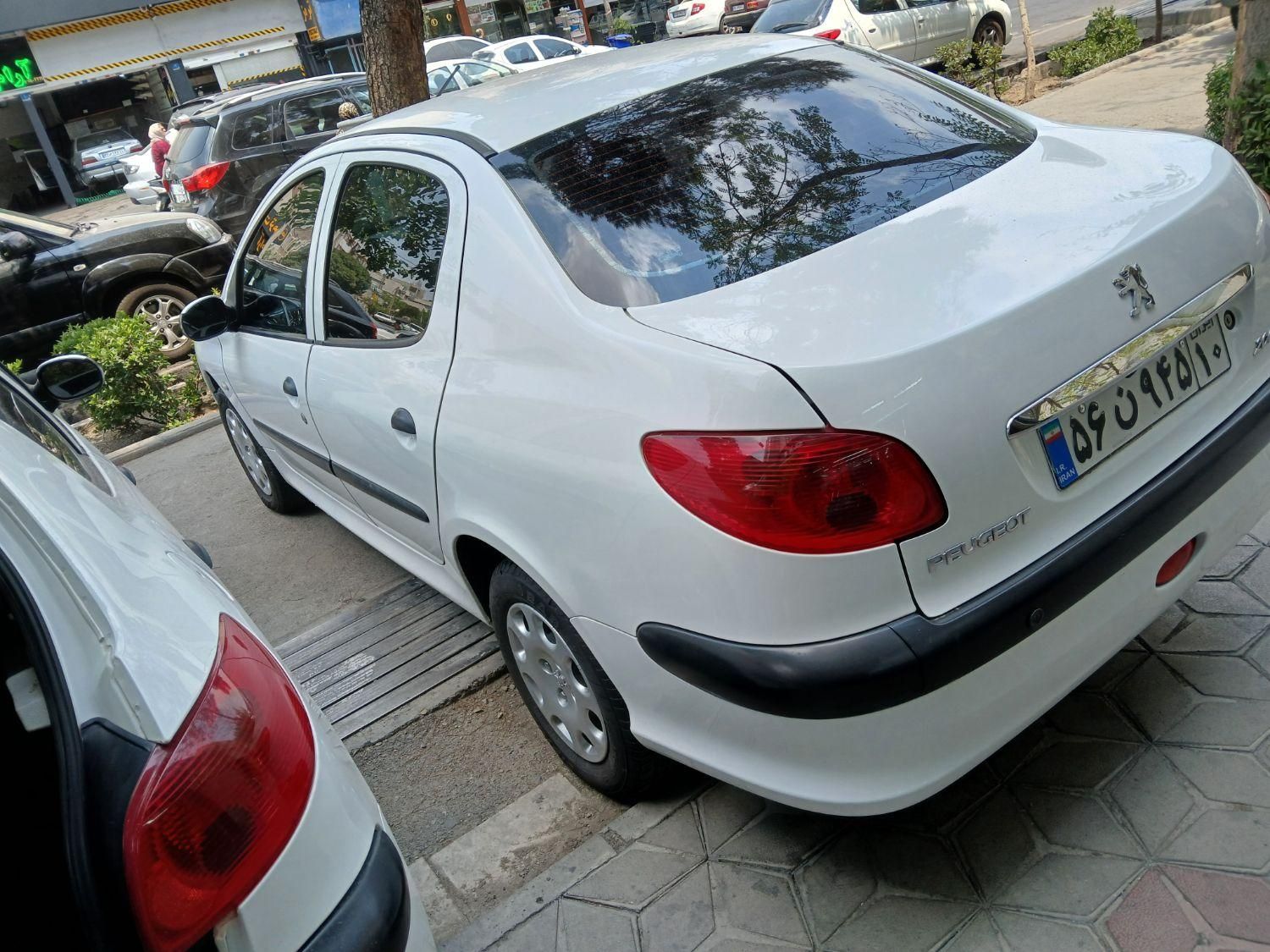 پژو ۲۰۶ صندوق دار v8 - 1397