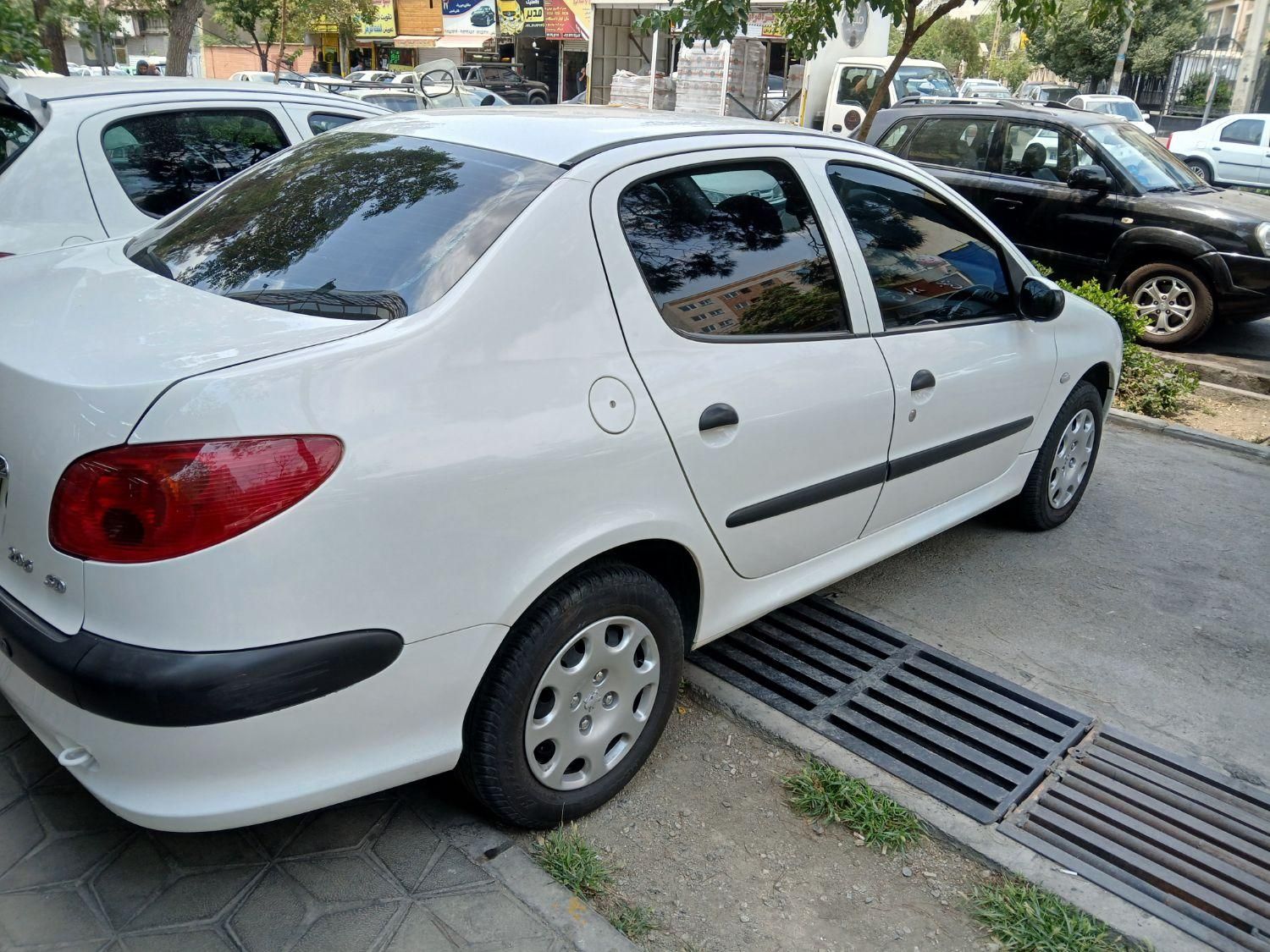 پژو ۲۰۶ صندوق دار v8 - 1397