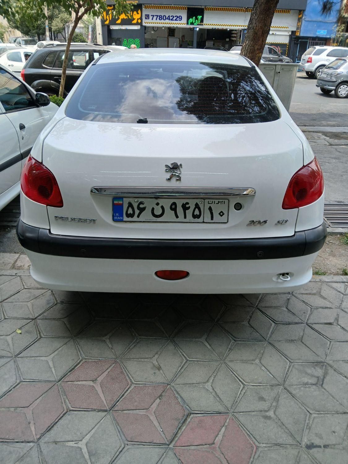 پژو ۲۰۶ صندوق دار v8 - 1397