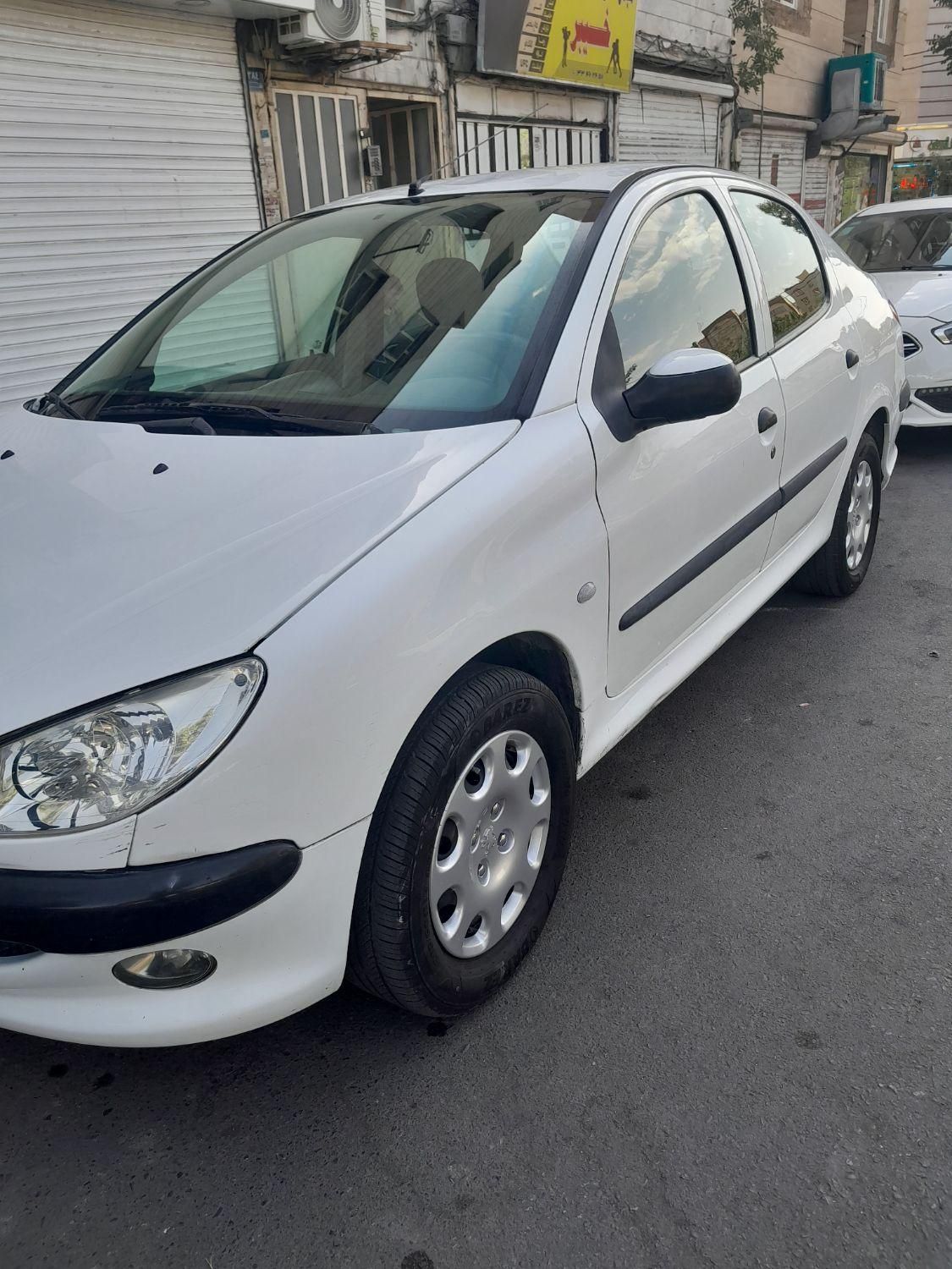 پژو ۲۰۶ صندوق دار v8 - 1396