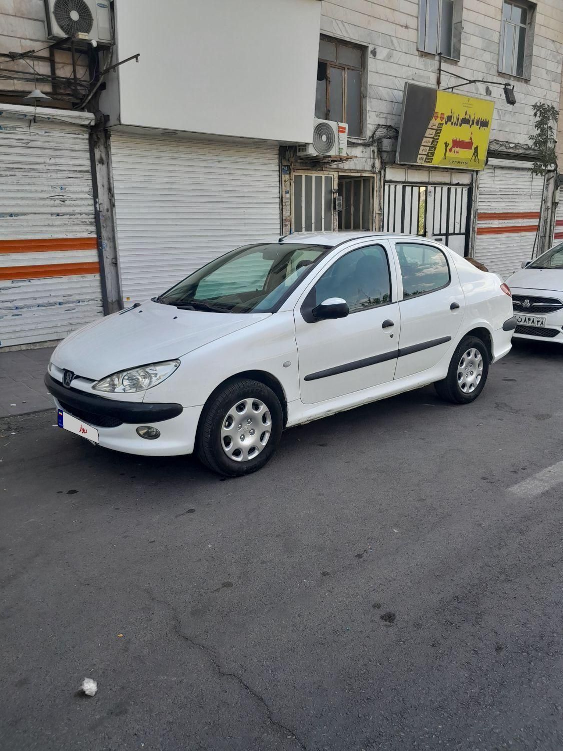 پژو ۲۰۶ صندوق دار v8 - 1396