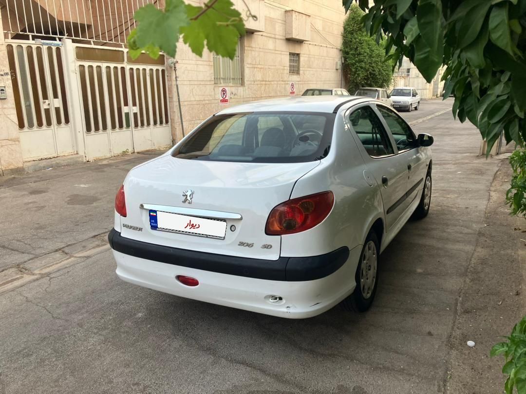 پژو ۲۰۶ صندوق دار v8 - 1394
