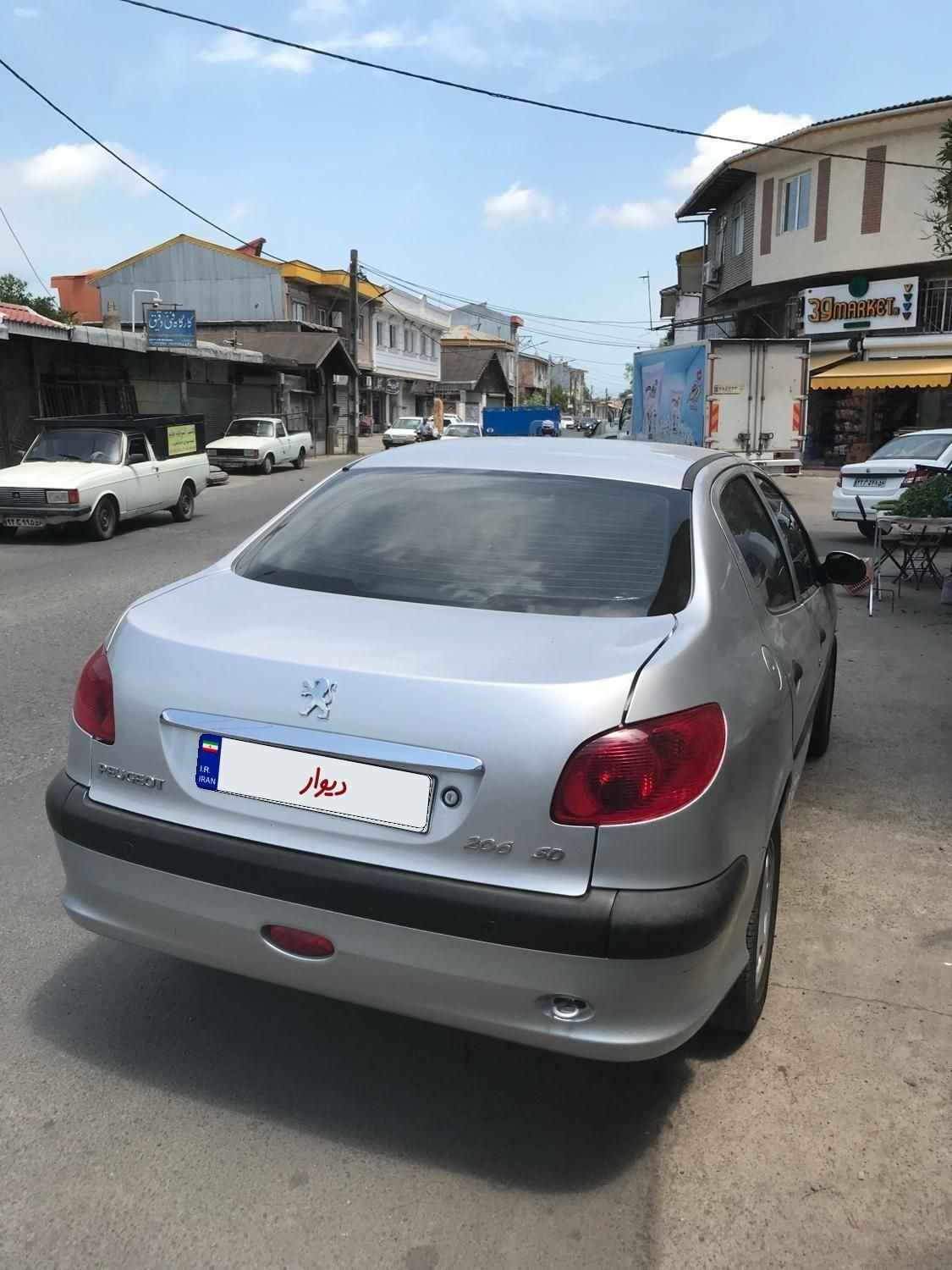 پژو ۲۰۶ صندوق دار v8 - 1394