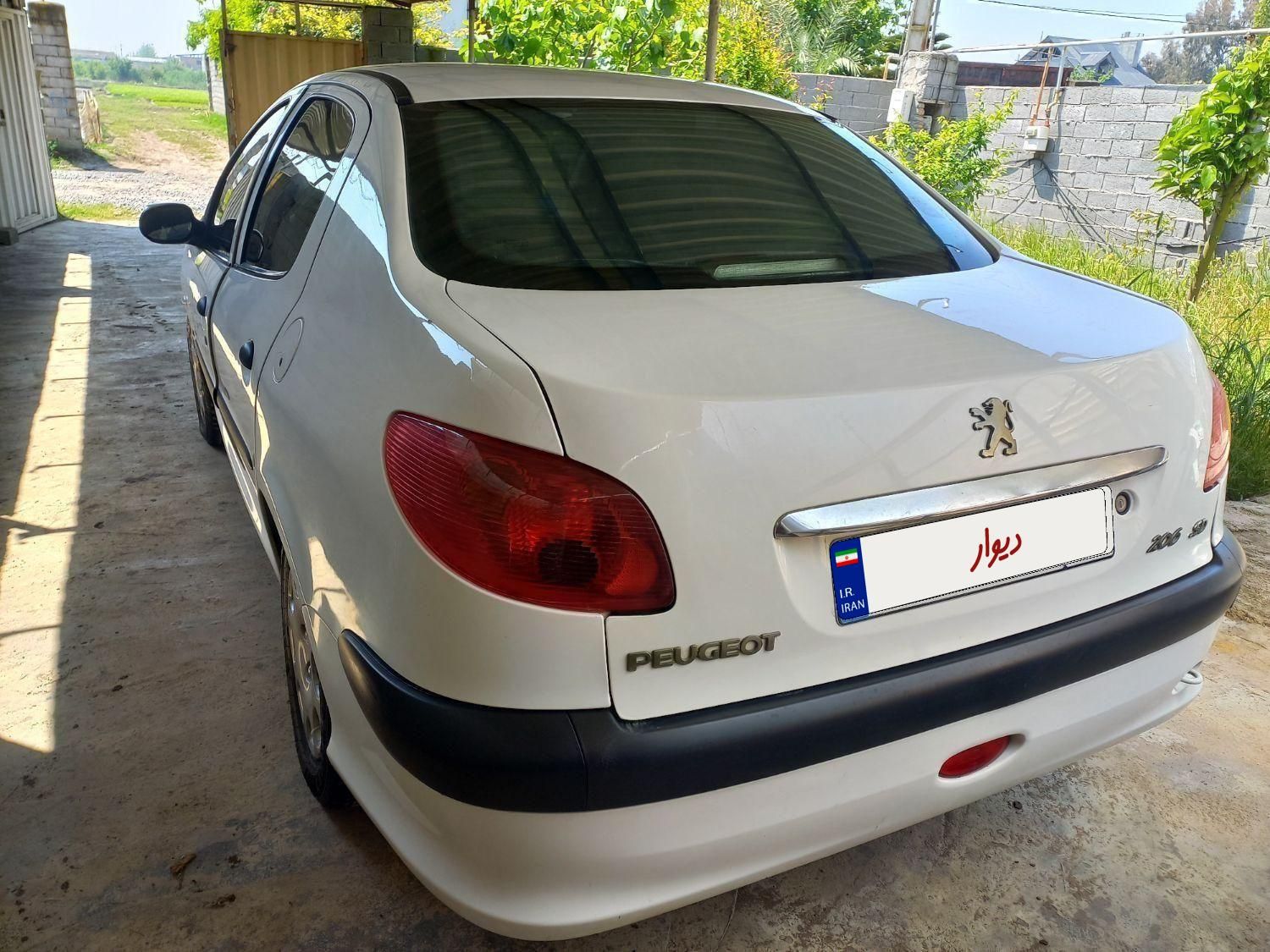 پژو ۲۰۶ صندوق دار v8 - 1390