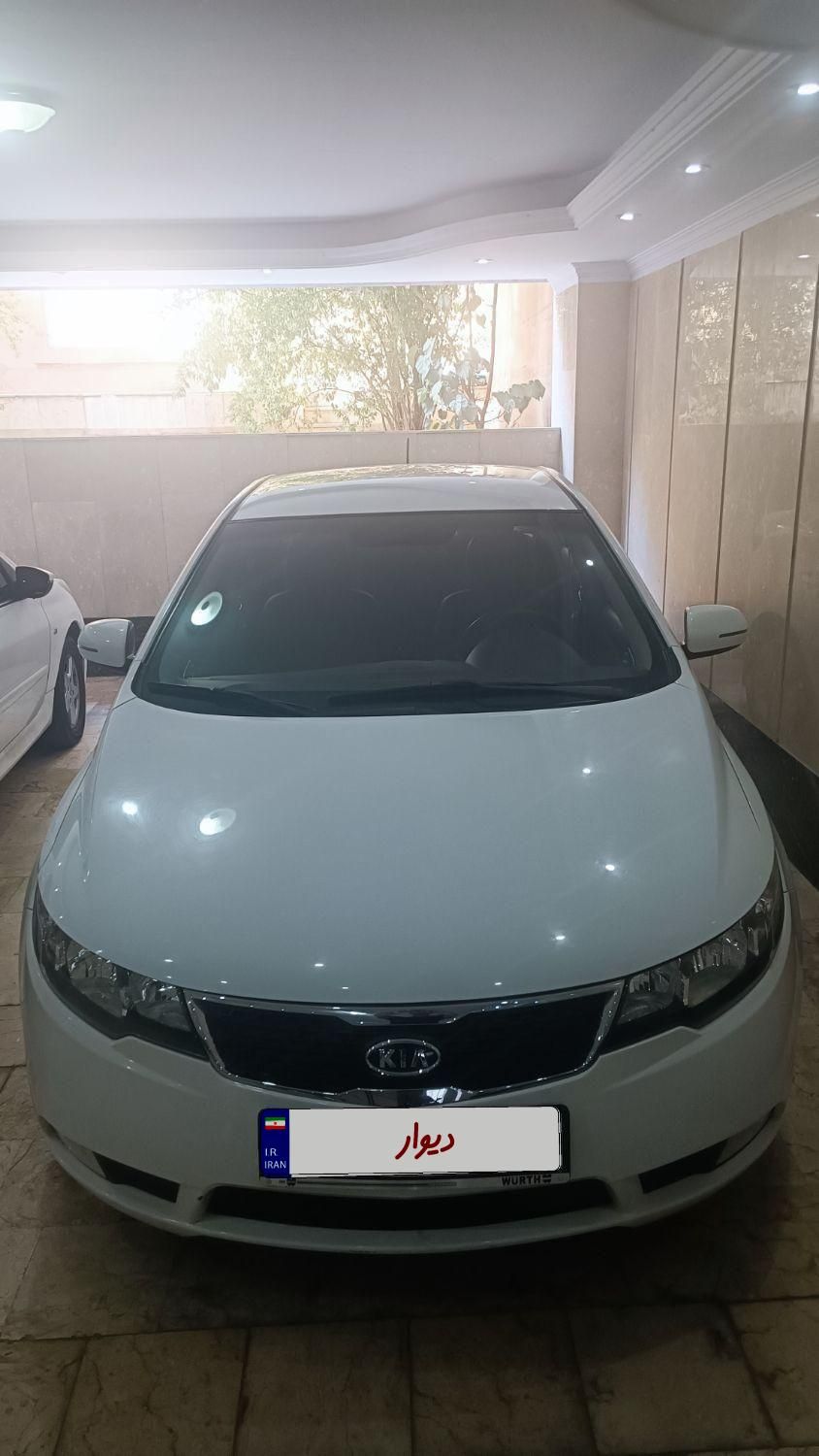 خودرو کیا، سراتو مونتاژ آگهی ann_19397573