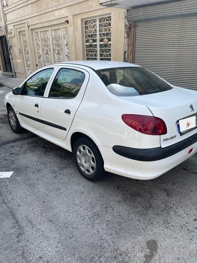 پژو ۲۰۶ صندوق دار v8 - 1397
