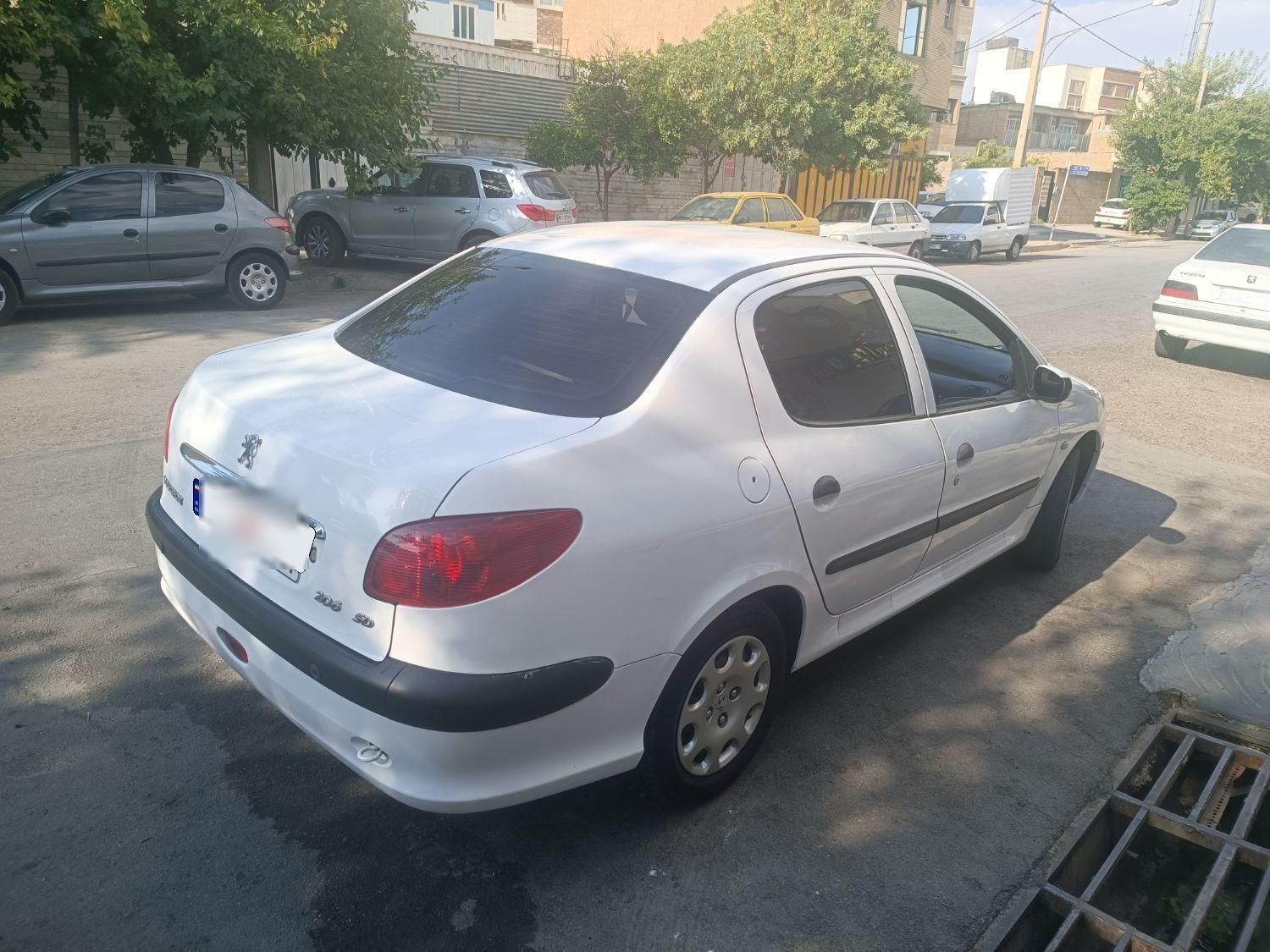 پژو ۲۰۶ صندوق دار v8 - 1398