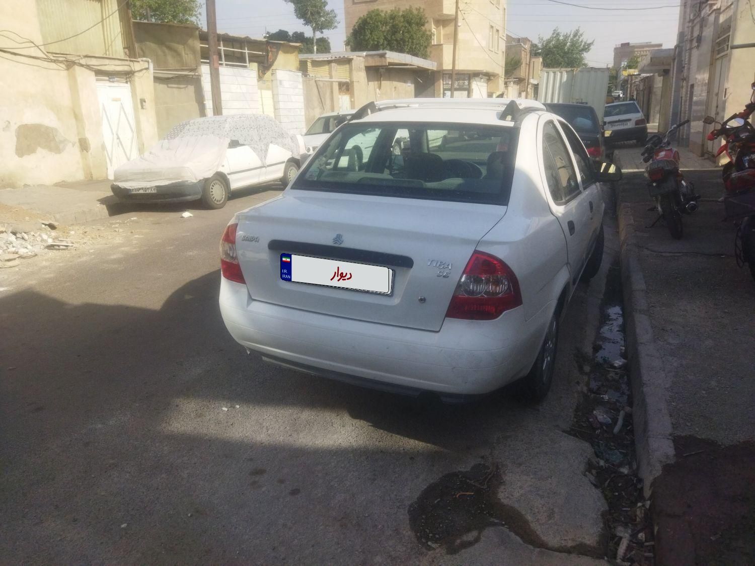 تیبا صندوق دار SX - 1392