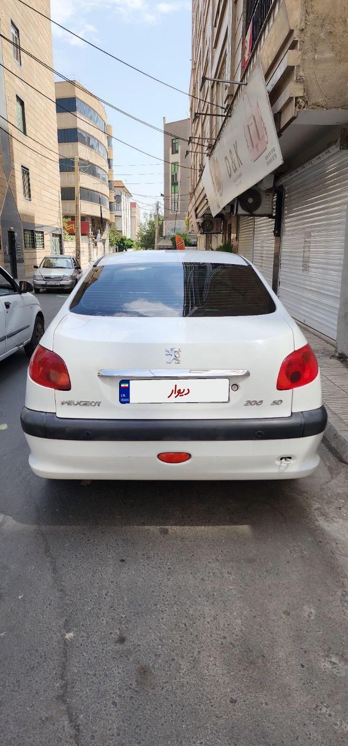 پژو ۲۰۶ صندوق دار v8 - 1396
