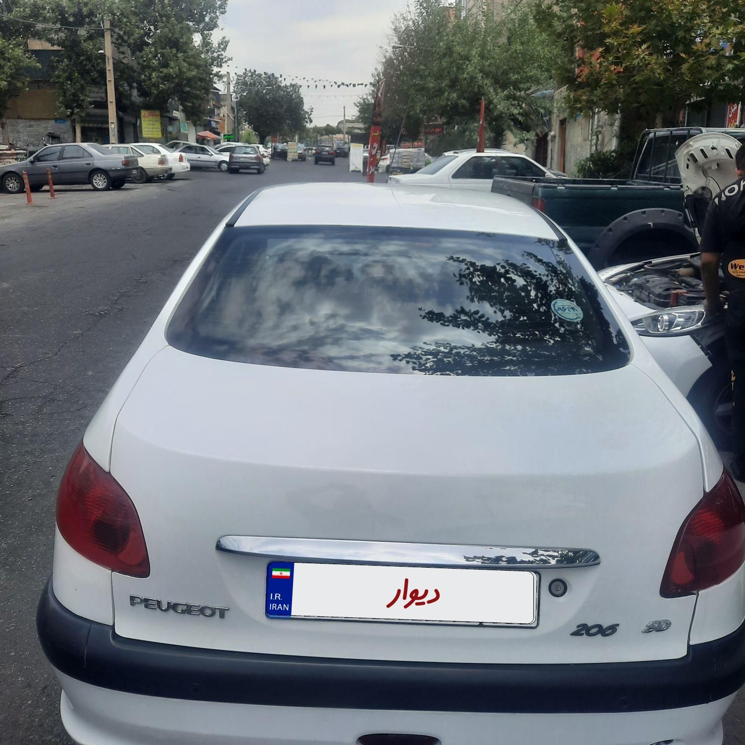 پژو ۲۰۶ صندوق دار v8 - 1395