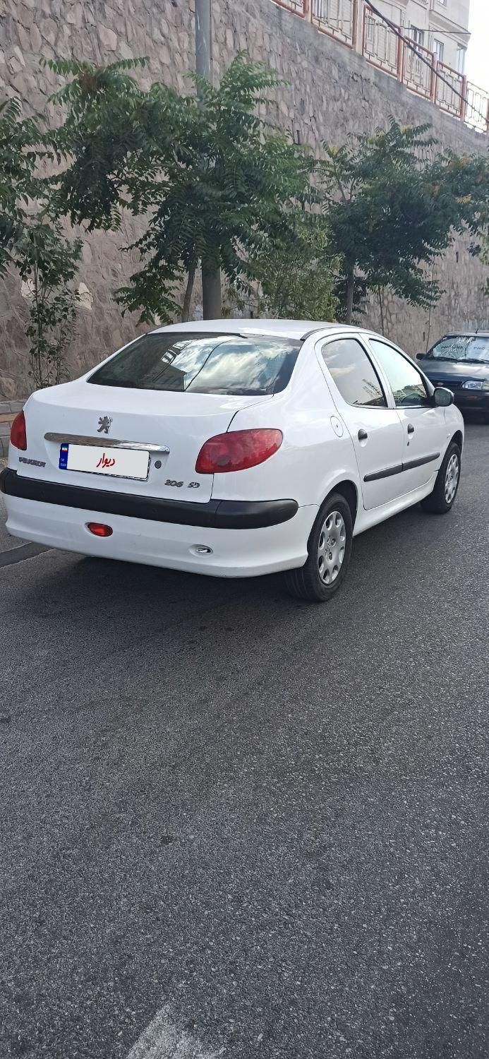 پژو ۲۰۶ صندوق دار v2 - 1391