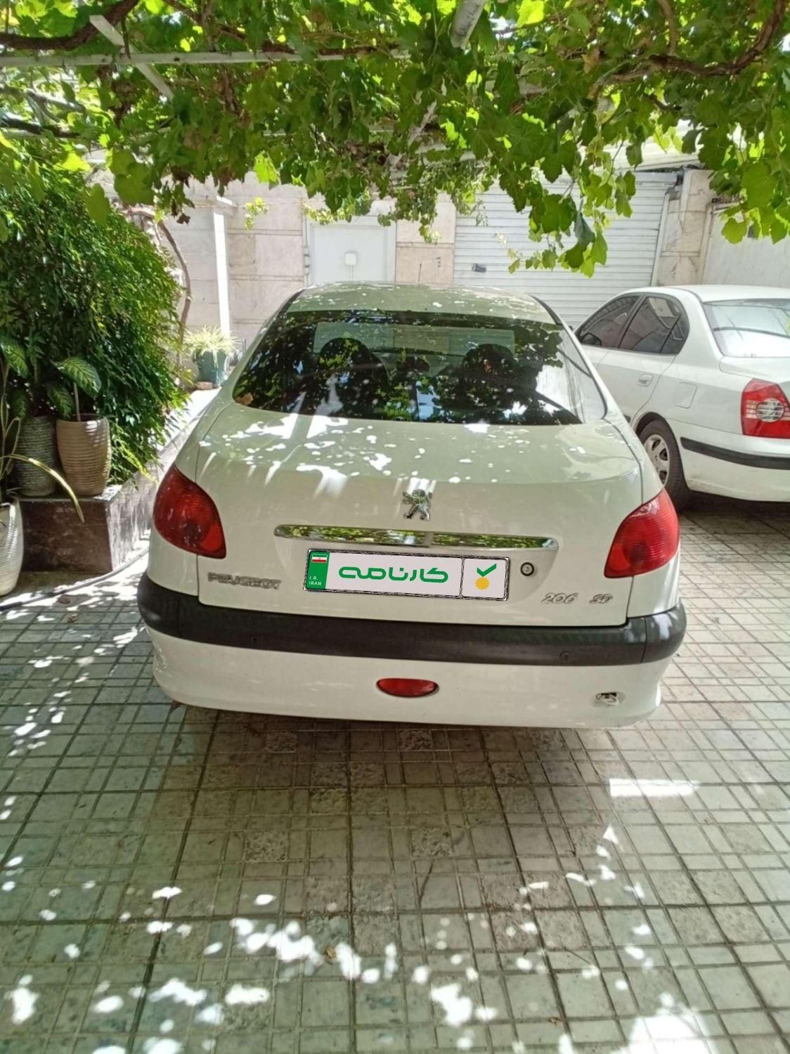 پژو ۲۰۶ صندوق دار v8 - 1397