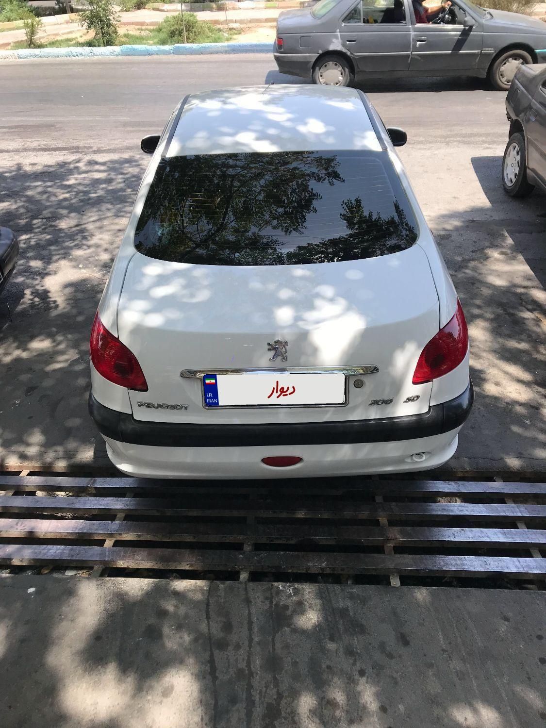 پژو ۲۰۶ صندوق دار v8 - 1395