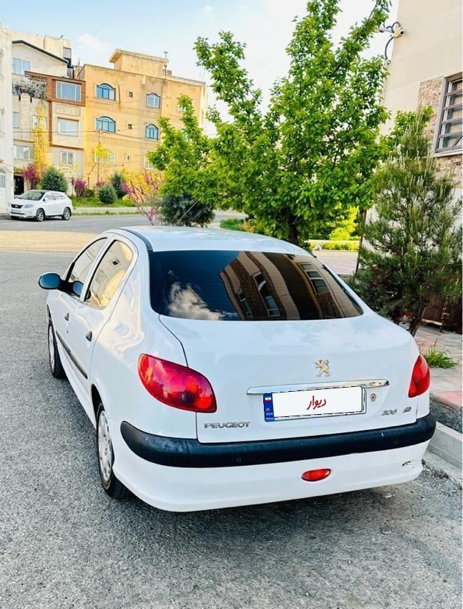 پژو ۲۰۶ صندوق دار v8 - 1395