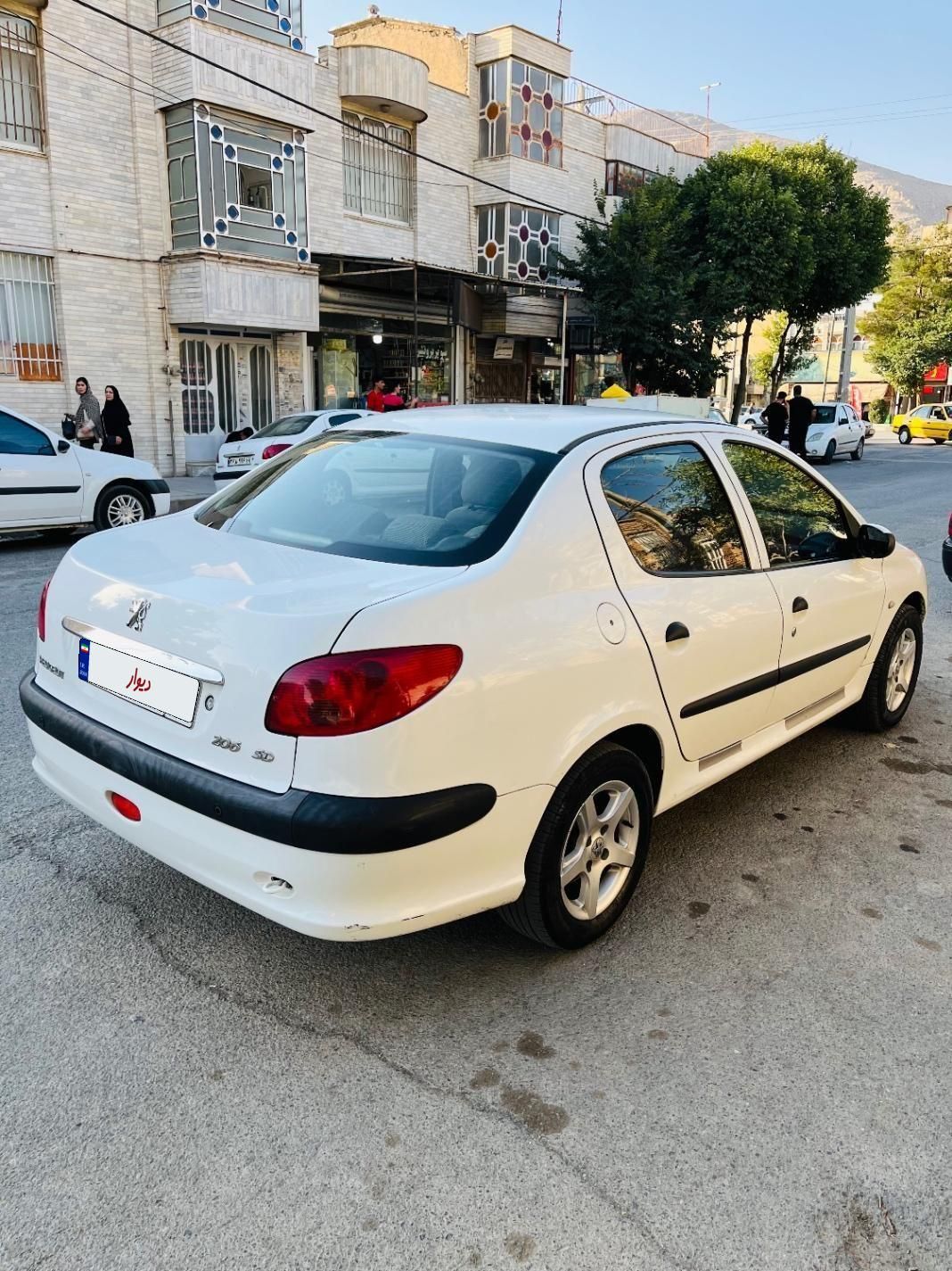 پژو ۲۰۶ صندوق دار v8 - 1394