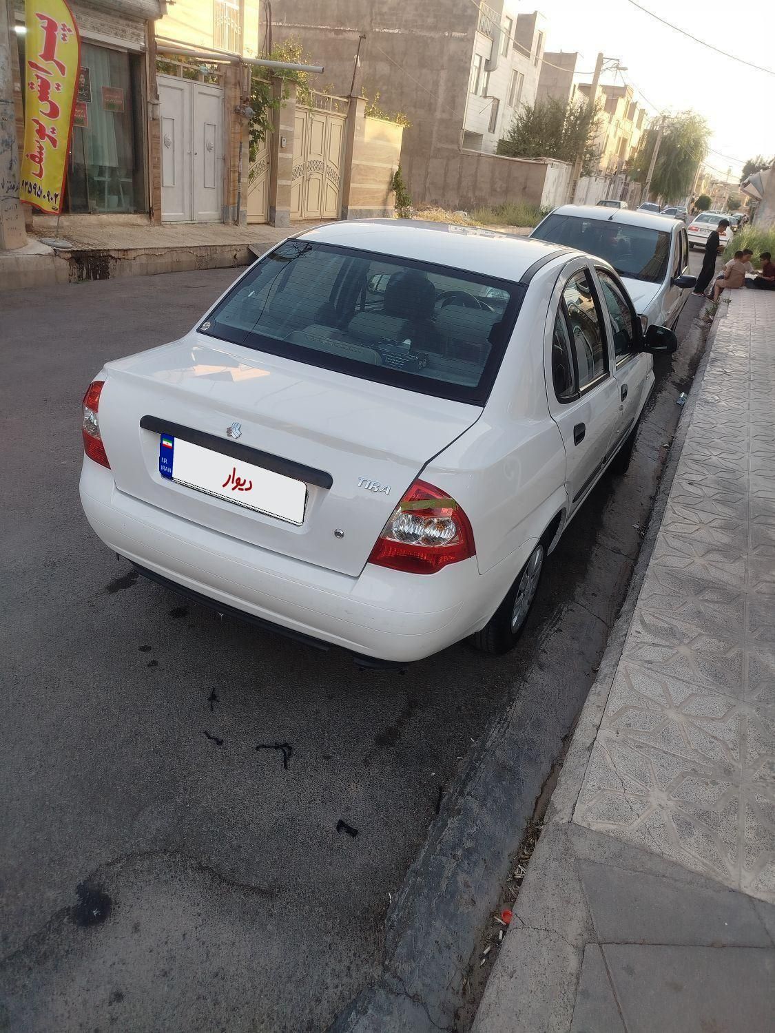 تیبا صندوق دار SX - 1401